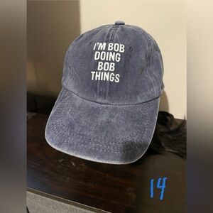 Unisex baseball hat. Distressed navy blue. “Bob doing Bob Things.” Adjustable.